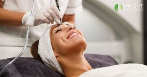 Model image of a woman receiving a microdermabrasion treatment